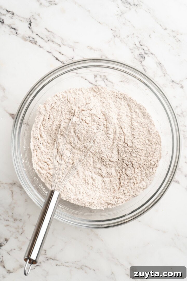 Mix dry ingredients. Whisking dry ingredients in glass bowl