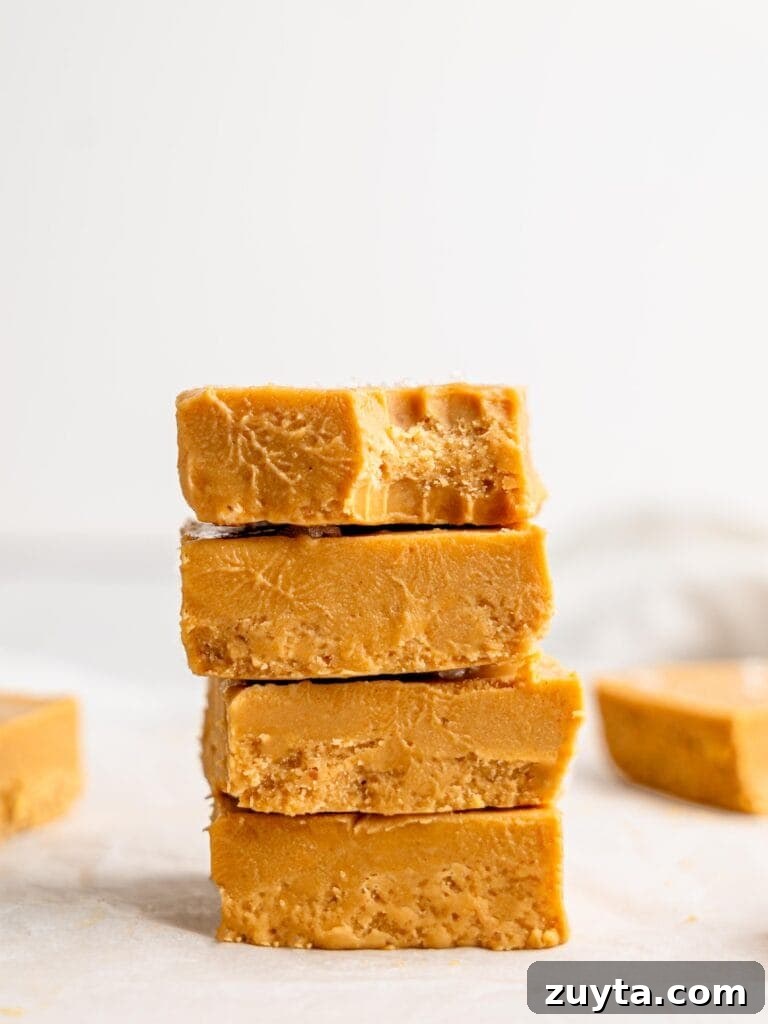 12 No-Bake Dessert Recipes for Parties and Weeknights 6 Four pieces of peanut butter fudge stacked on top of each other.