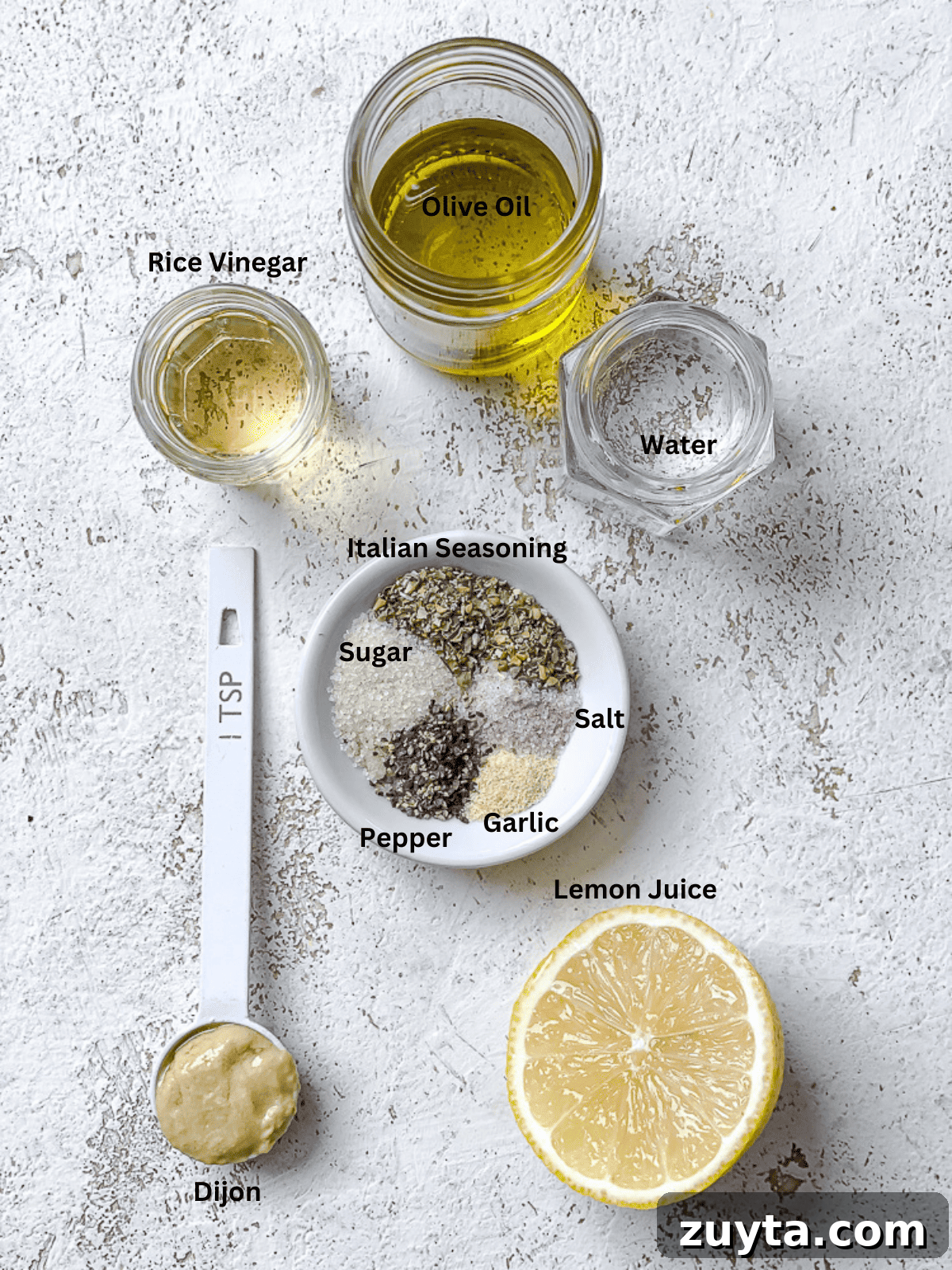 ingredients for Basic Italian Dressing Recipe [3 Minute] measured out against a white surface