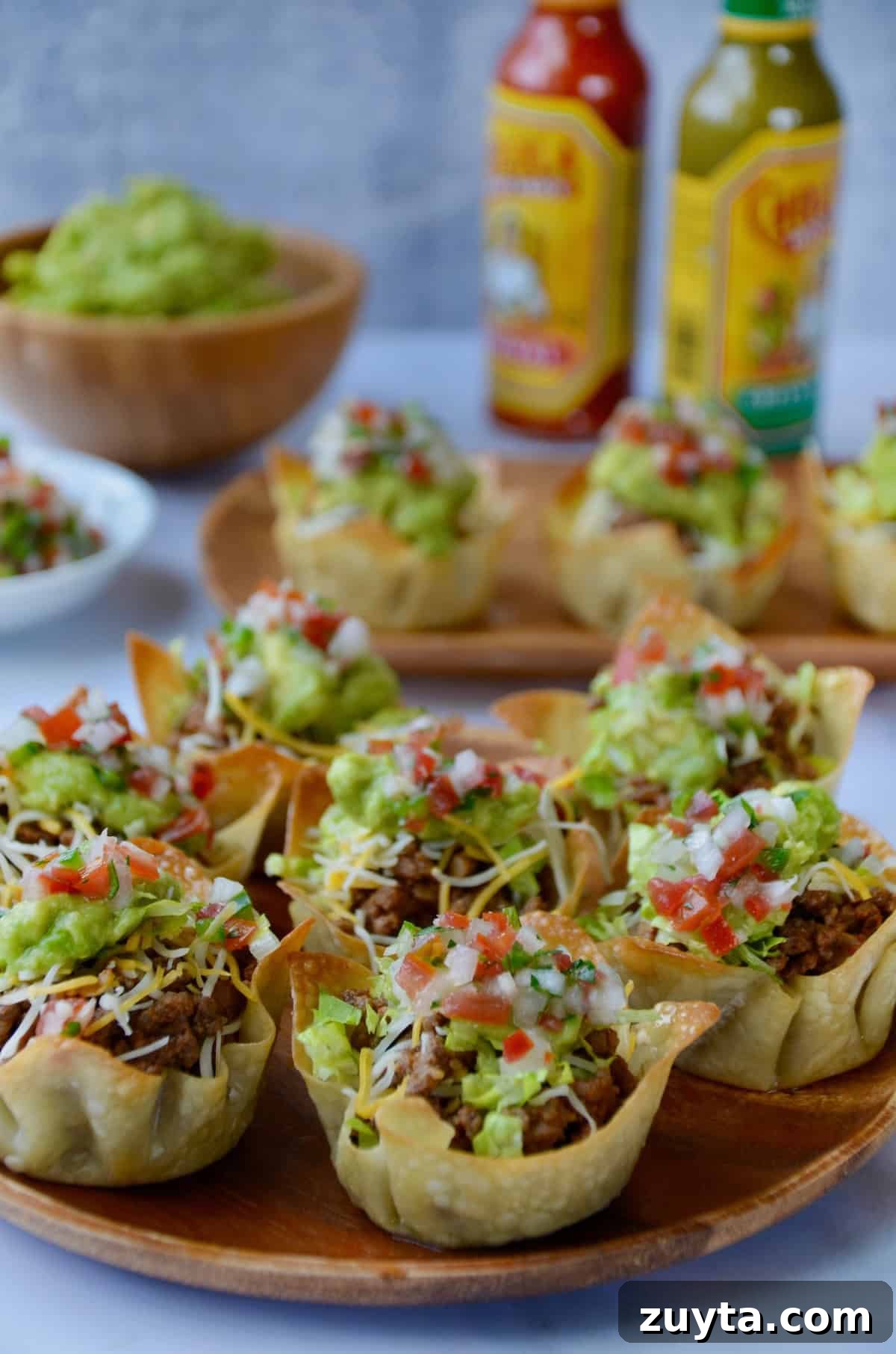 Homemade Taco Seasoning Mix Recipe 4 Taco salad cups in wonton wrappers on a serving platter.