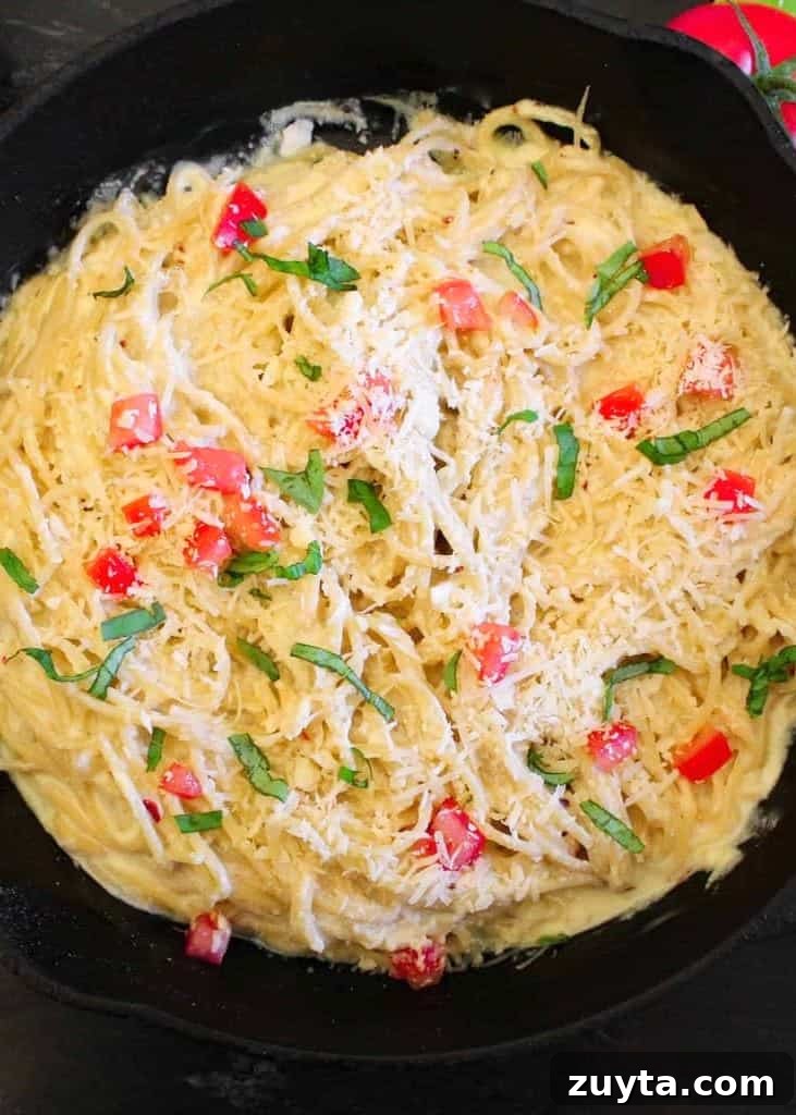 Creamy Ricotta Carbonara Pasta Recipe 2 Pasta carbonara in black bowl.