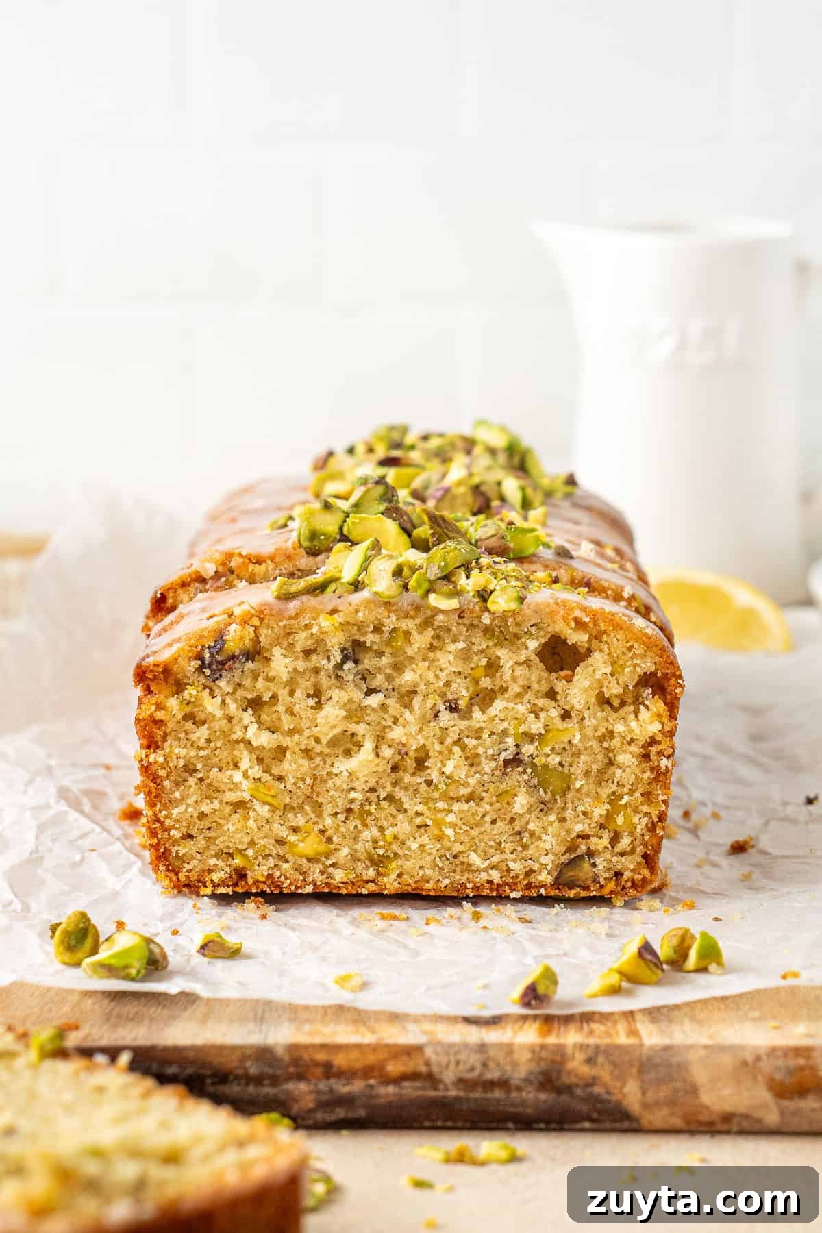 Lemon Pistachio Loaf Cake with Cardamom 2 The pistachio lemon loaf cake sliced.