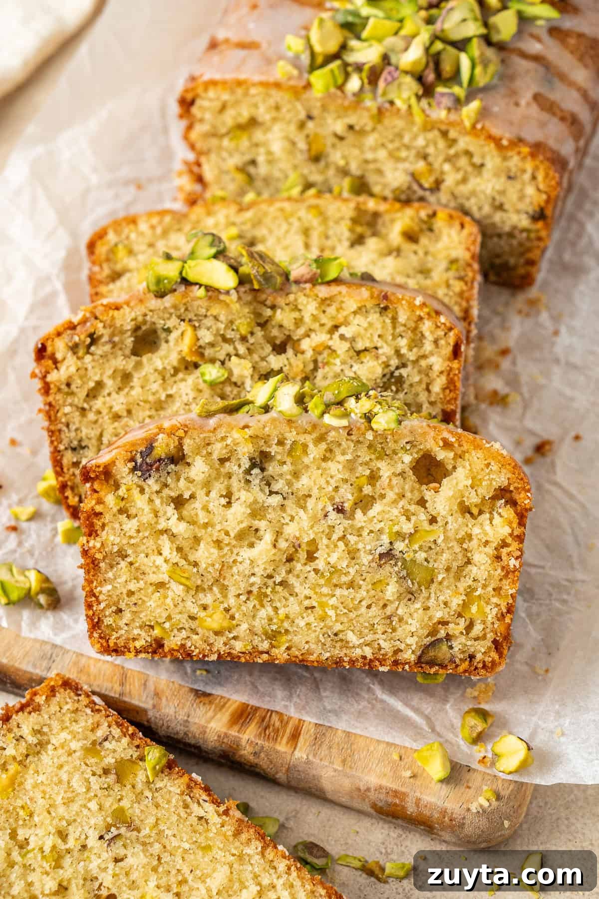 Lemon Pistachio Loaf Cake with Cardamom 10 Lemon pistachio cardamom loaf cake sliced.
