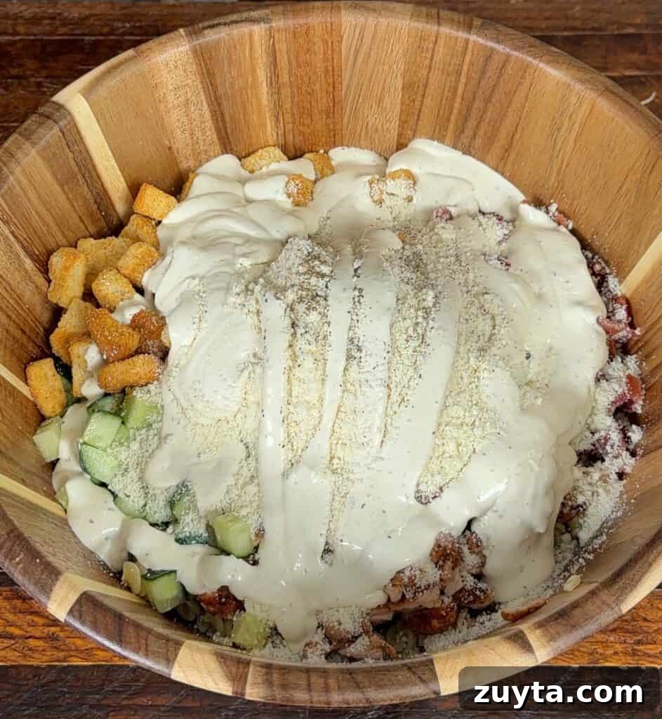 Adding cheese and dressing