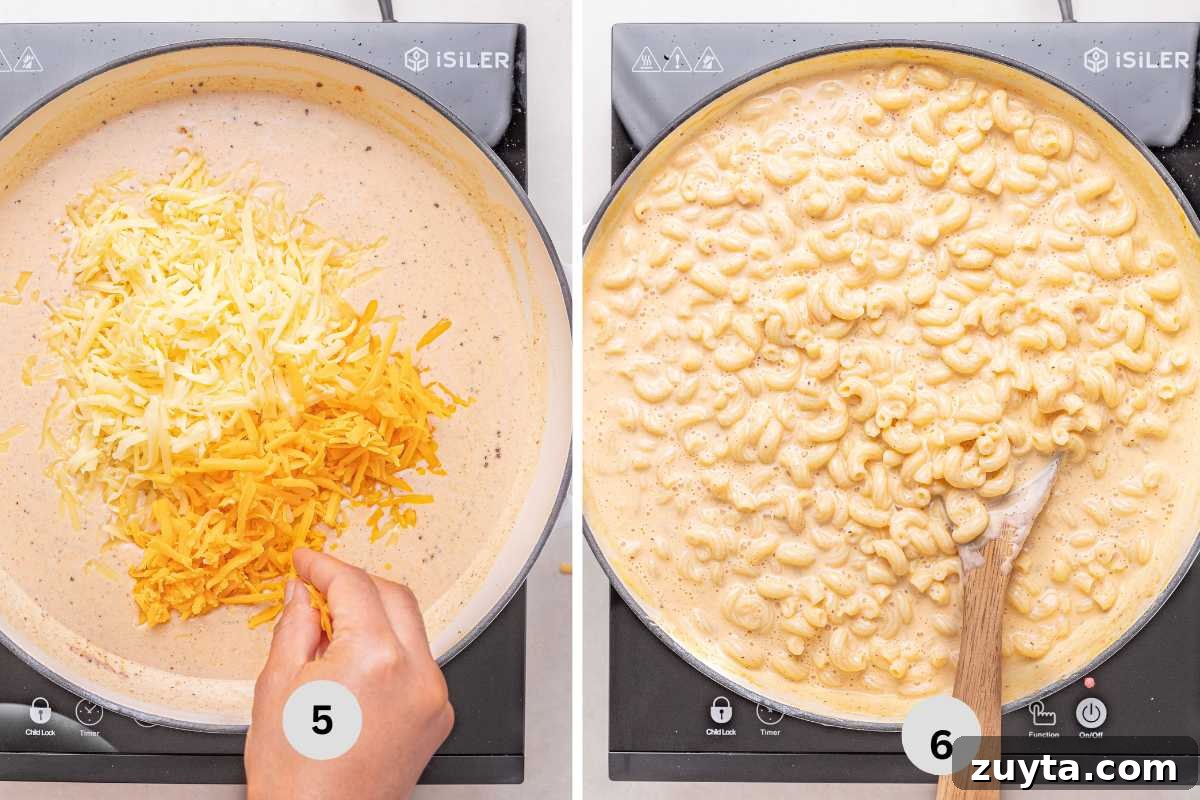 Adding the gouda and cheddar cheese into the cream base, then stirring in the macaroni.