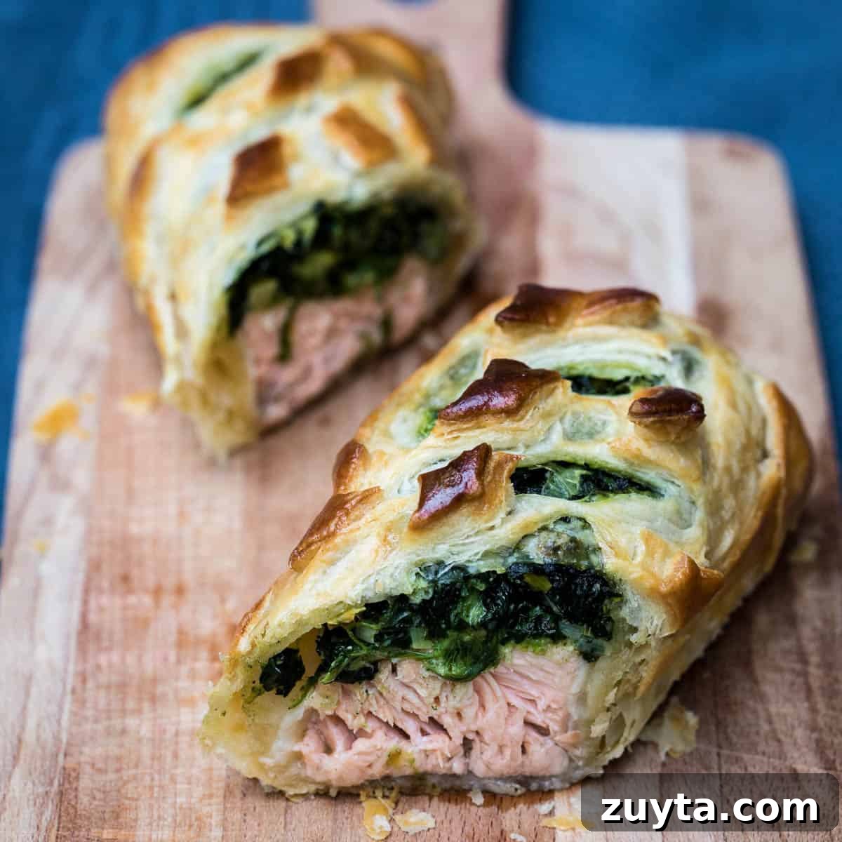 Soy-Ginger Salmon Stir-Fry with Vegetables 12 Salmon Wellington, cut in half, on a cutting board