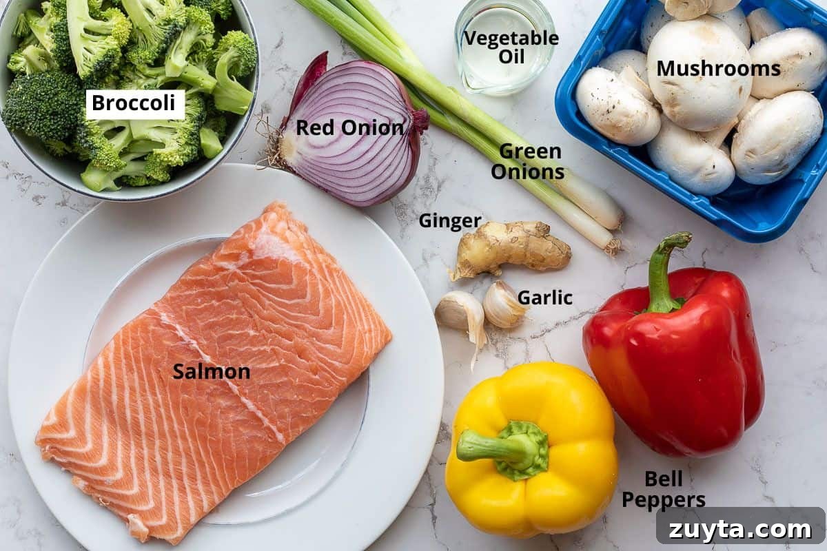 Soy-Ginger Salmon Stir-Fry with Vegetables 4 salmon, broccoli, red onion, mushrooms, peppers, garlic, ginger, green onions, and vegetable oil.