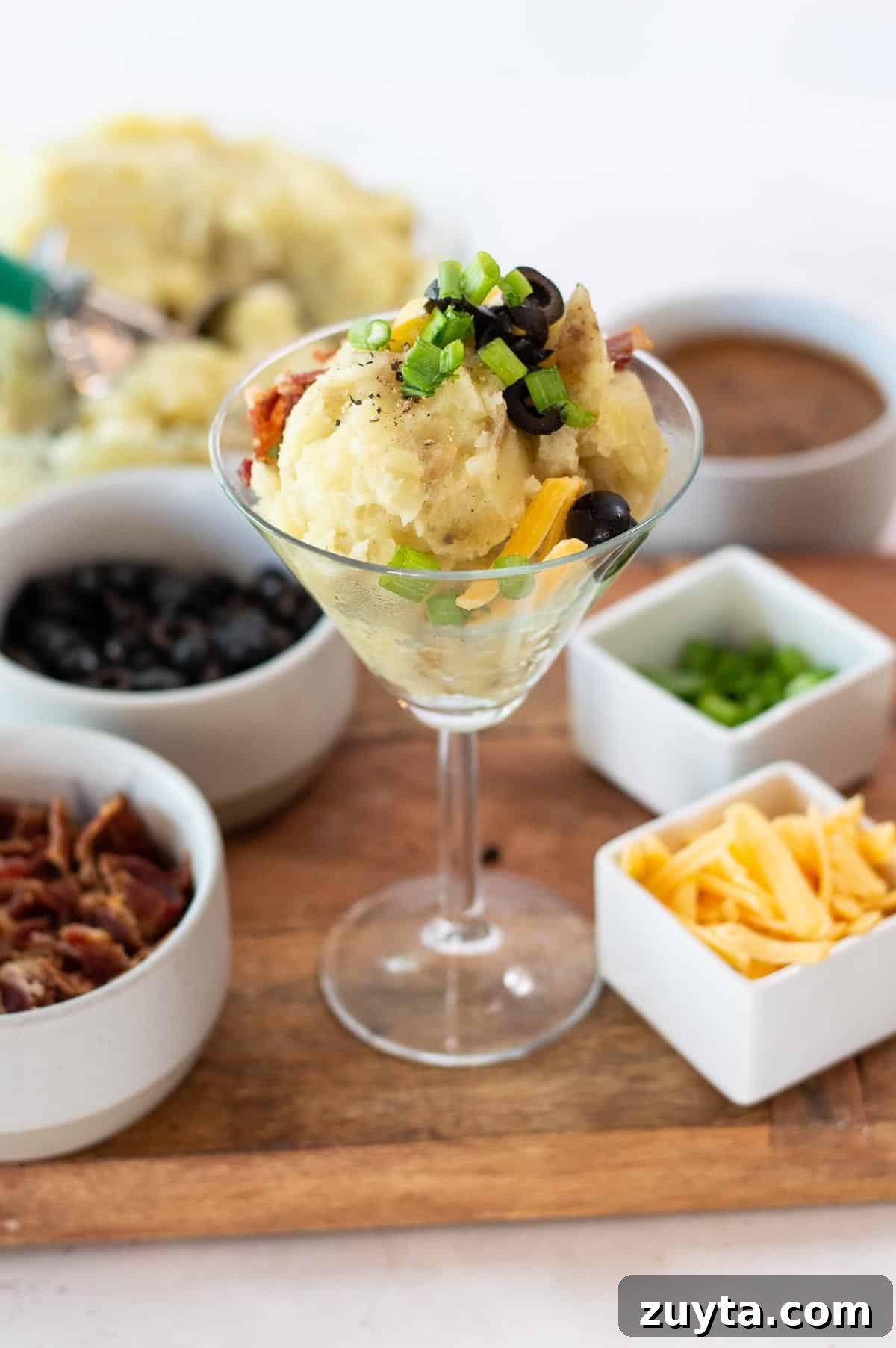 Mashed Potato Toppings Bar and Mashtini Cocktail Recipes 2 mashed potatoes in a martini glass with toppings