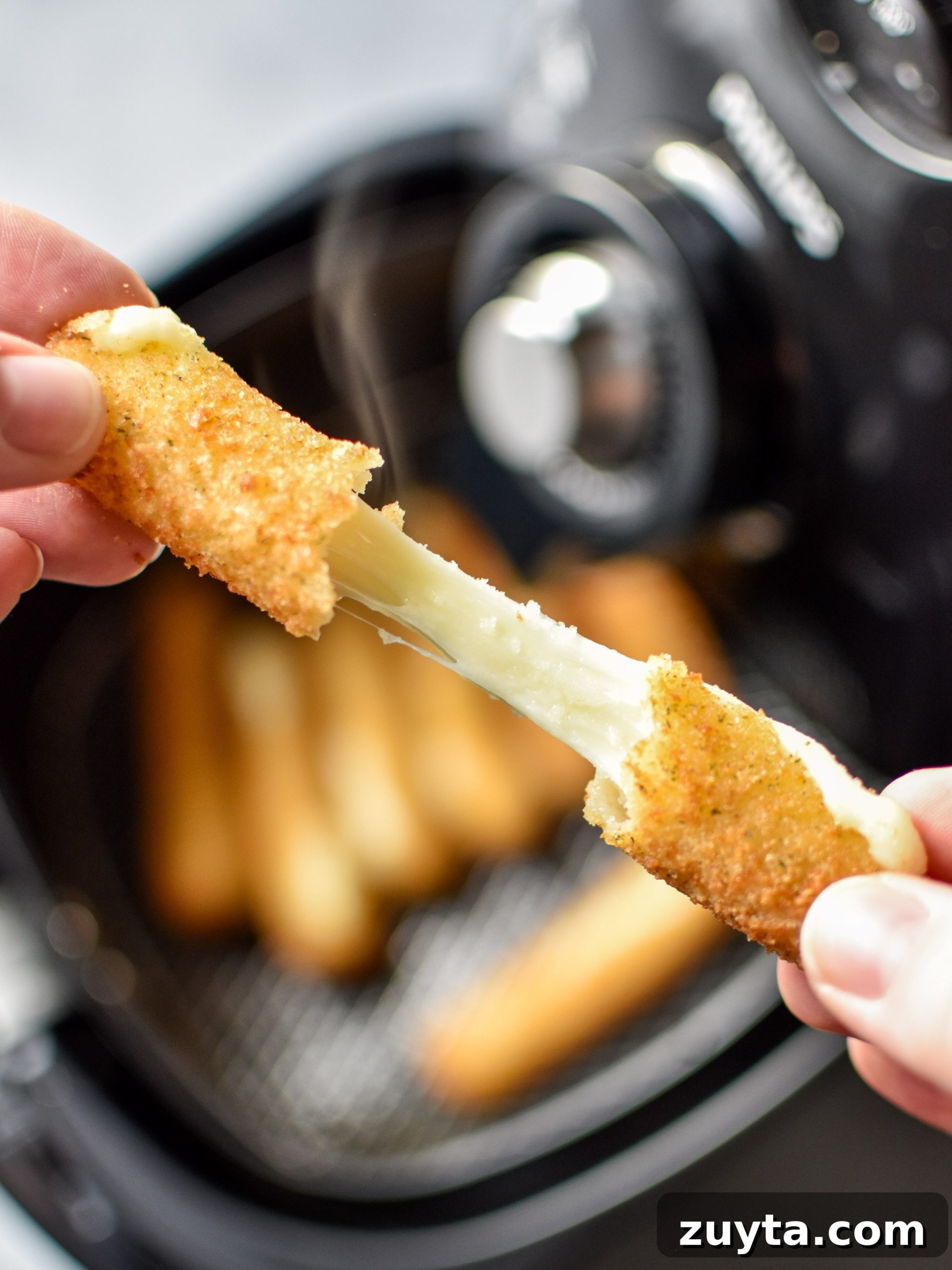 10 Trader Joe's Foods to Cook in Your Air Fryer 12 Cheesy mozzarella stick made in the air fryer!