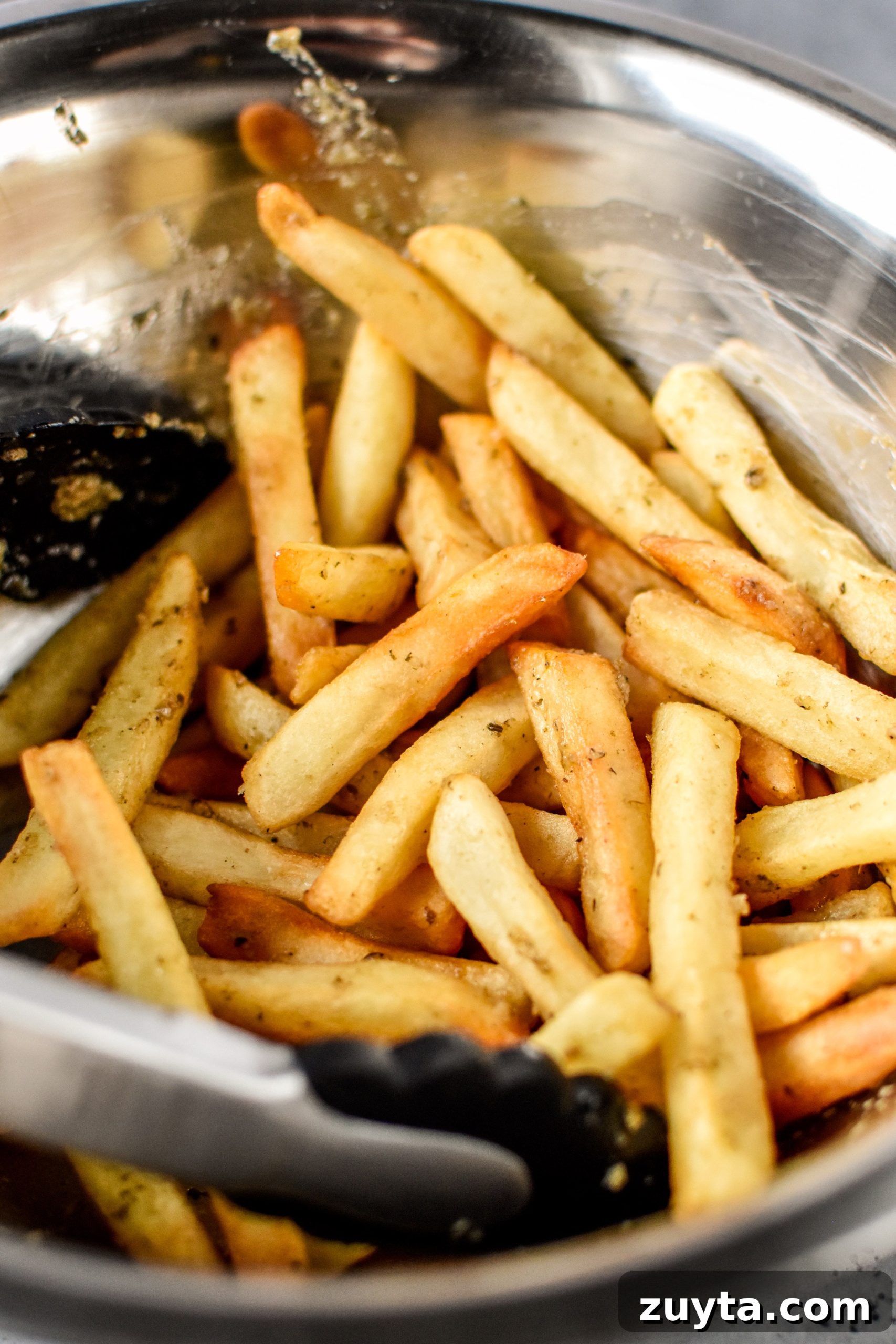 10 Trader Joe's Foods to Cook in Your Air Fryer 8 Garlic fries from Trader Joe's made in the air fryer to golden brown perfection!