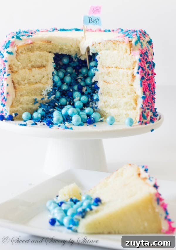 Tall 6-layer white cake covered with sweet and tangy cream cheese frosting and filled with colorful candies and sprinkles inside. Deliciously fun way to reveal the gender of a new bundle of joy!
