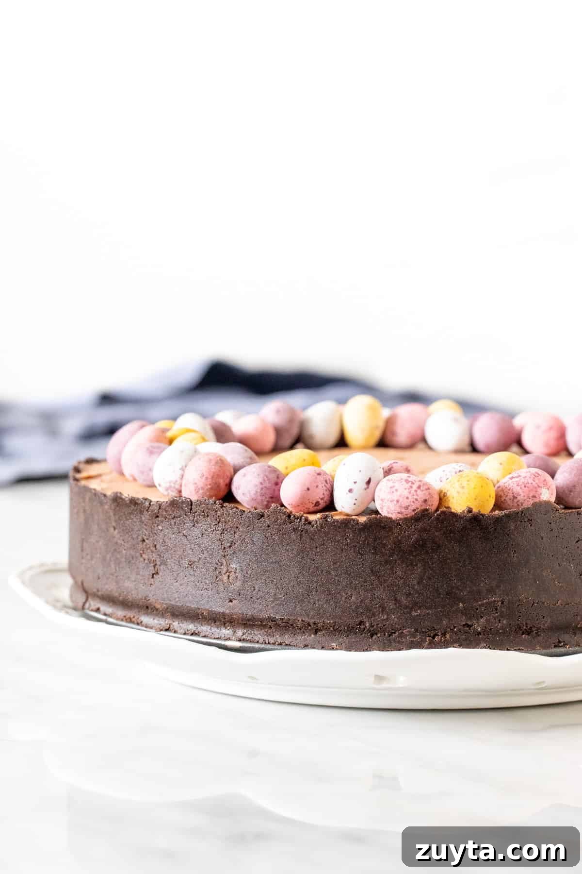 Cheesecake with Oreo crust and chocolate candies on top