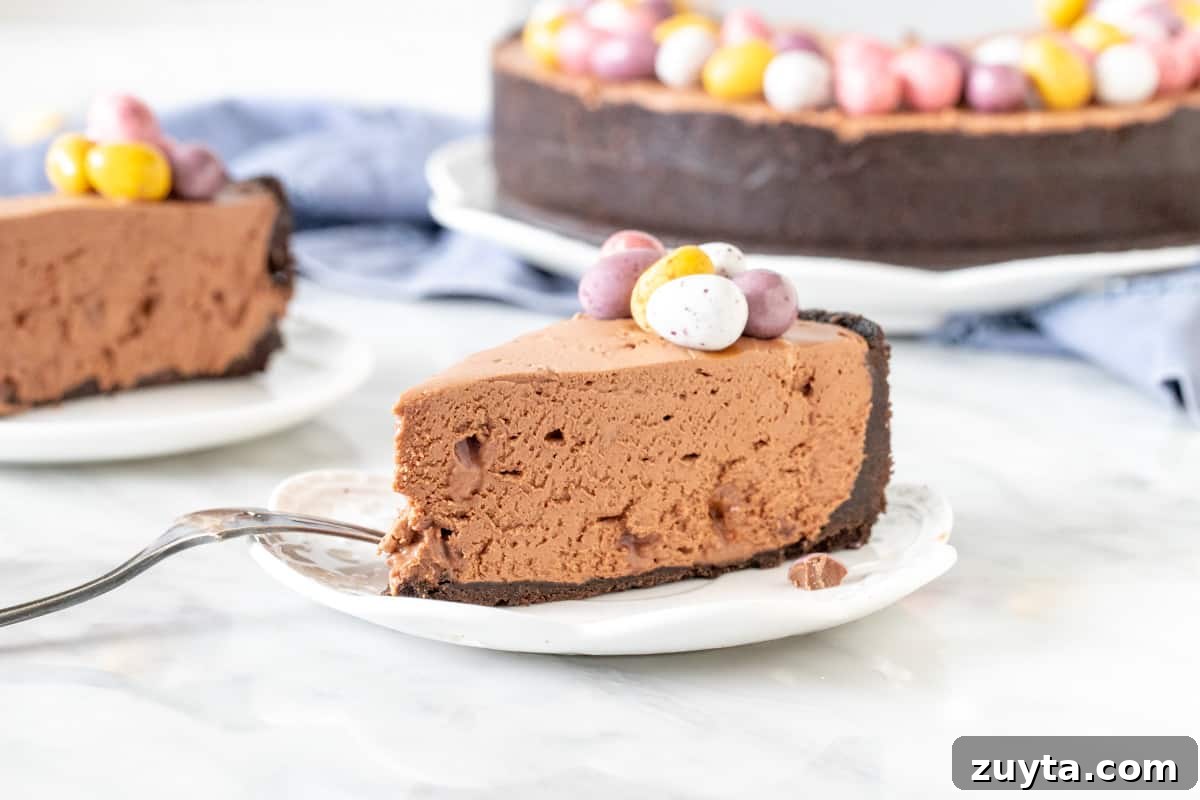 Slice of chocolate cheesecake with Easter chocolates on top