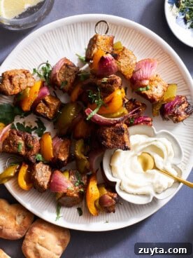 A plate of grilled steak skewers.