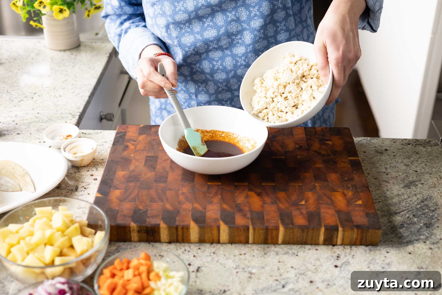 Creamy Corn Chowder with Smoky Tofu Bacon Bits 8 adding crumbled tofu to the bowl of marinade