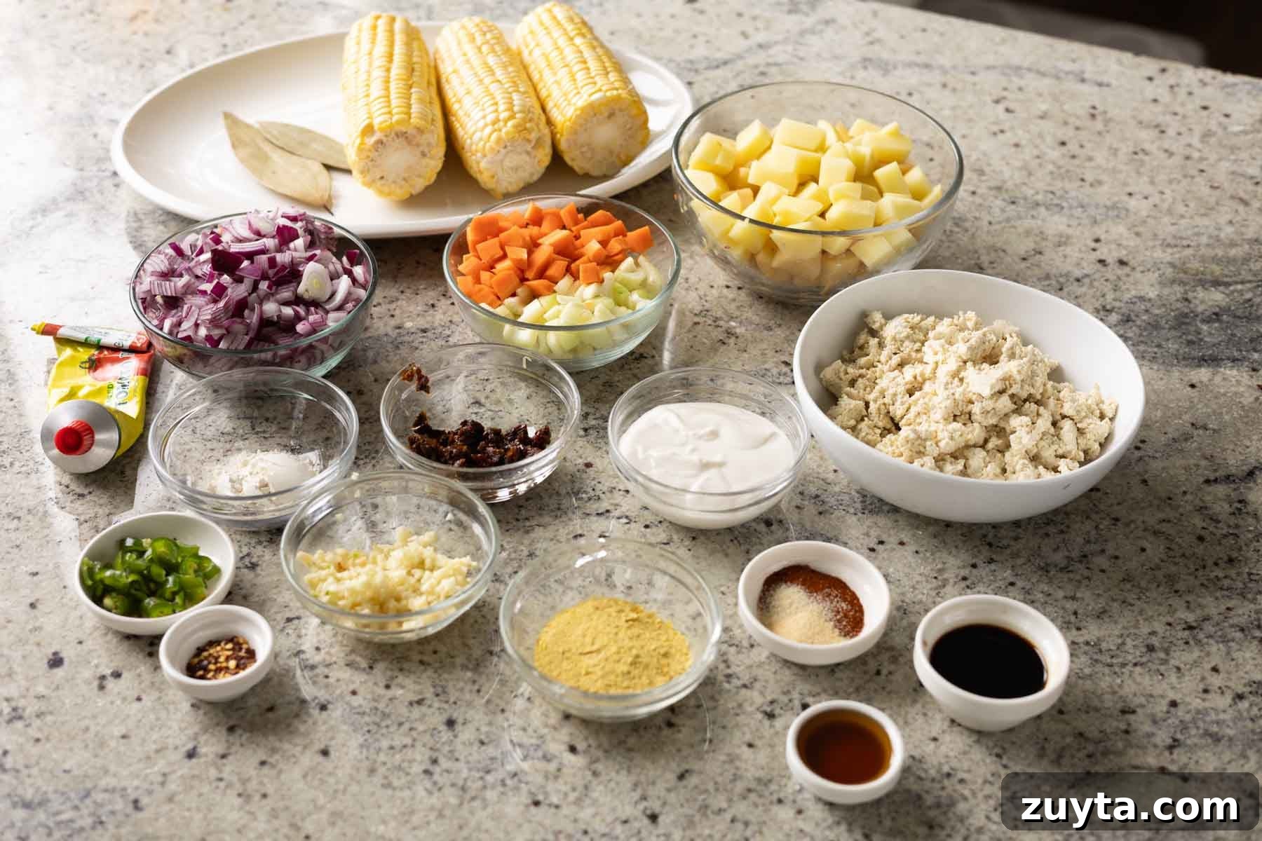 Creamy Corn Chowder with Smoky Tofu Bacon Bits 16 corn chowder ingredients on the kitchen counter