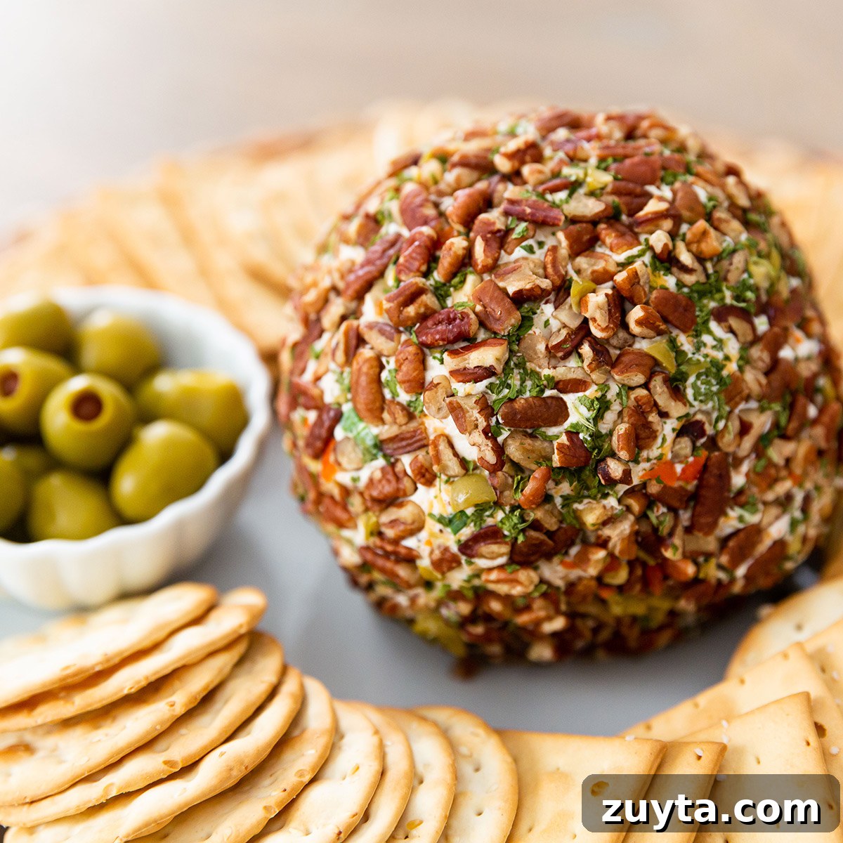 How to Make an Olive Cheese Ball 5 Olive Cheese Ball with Crackers