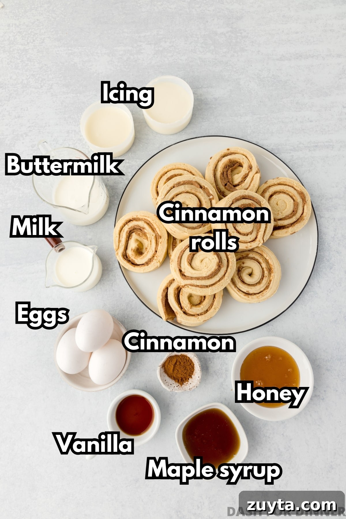 Cinnamon Roll Casserole Recipe with Cream Cheese Glaze 3 The ingredients needed to make cinnamon roll casserole: refrigerated rolls, maple syrup, honey, milk, eggs, etc.