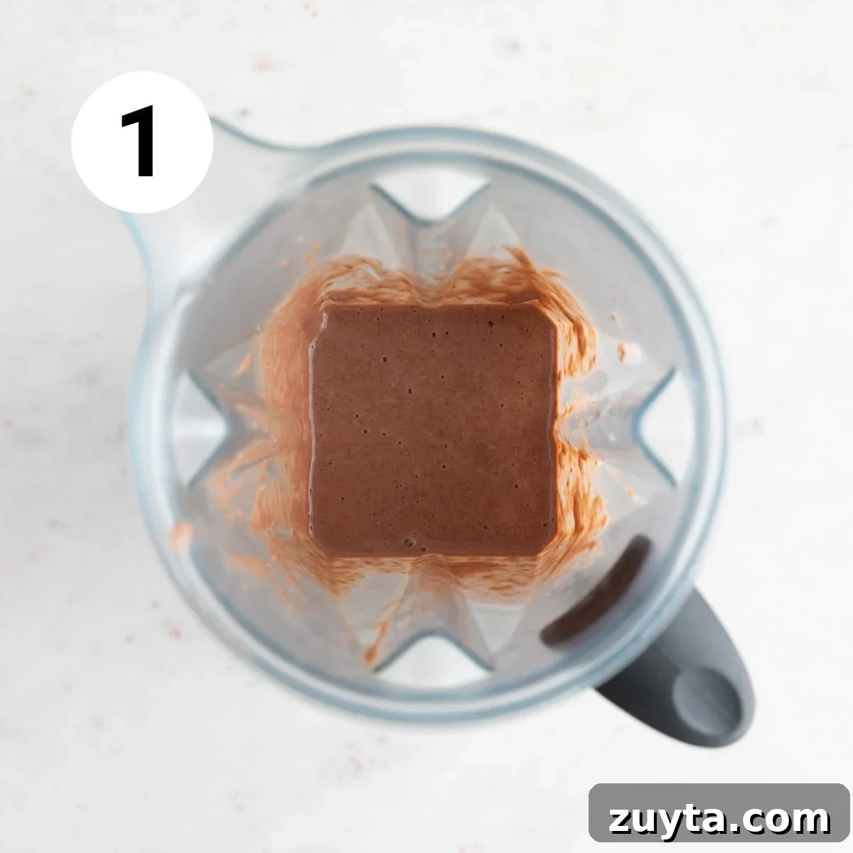 Creamy Vegan Protein Shake Recipe 4 Blender mug with vegan protein shake.