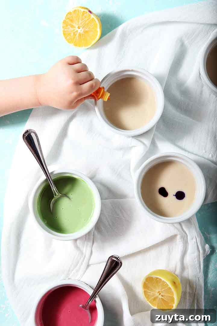 Lemon Tea Cakes Recipe with Zesty Glaze 5 A girl uses food coloring to color Lemon Icing