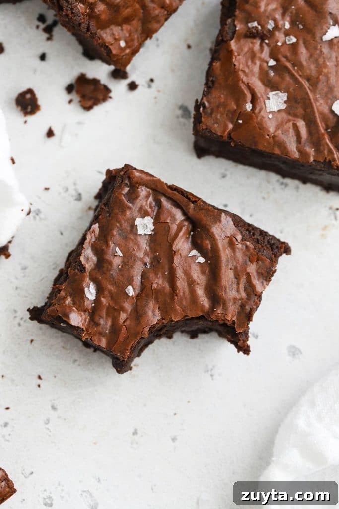 Fudgy Gluten-Free Marshmallow Brownies Recipe 10 Close up overhead view of fudgy gluten-free brown butter brownies cut in squares