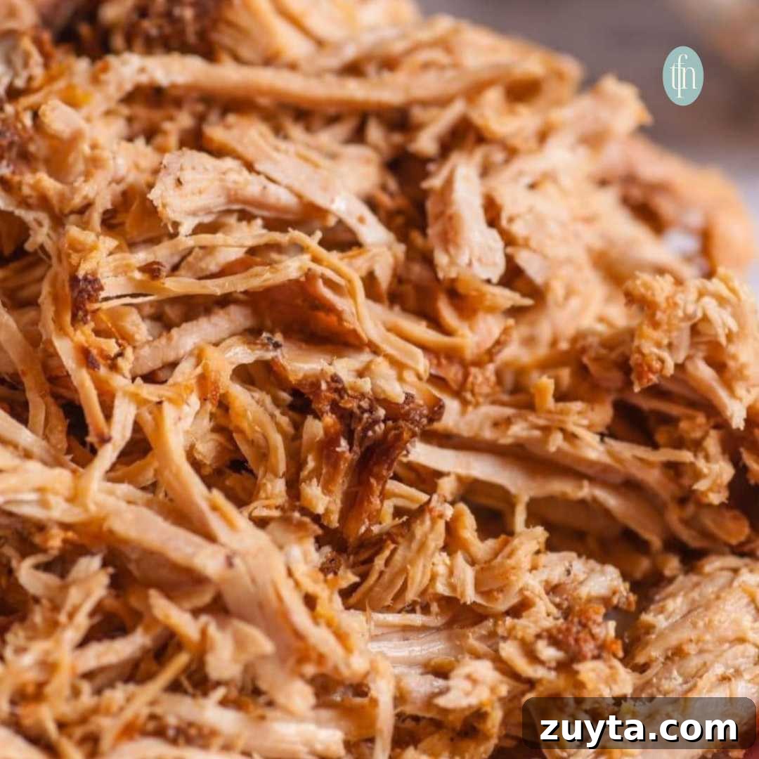 Tender Slow Cooker Shredded Chuck Roast Recipe 2 Close up of shredded chuck roast.