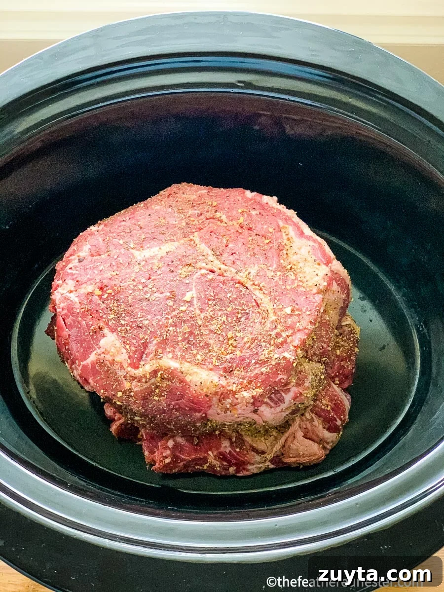 Tender Slow Cooker Shredded Chuck Roast Recipe 3 chuck roast in slow cooker.
