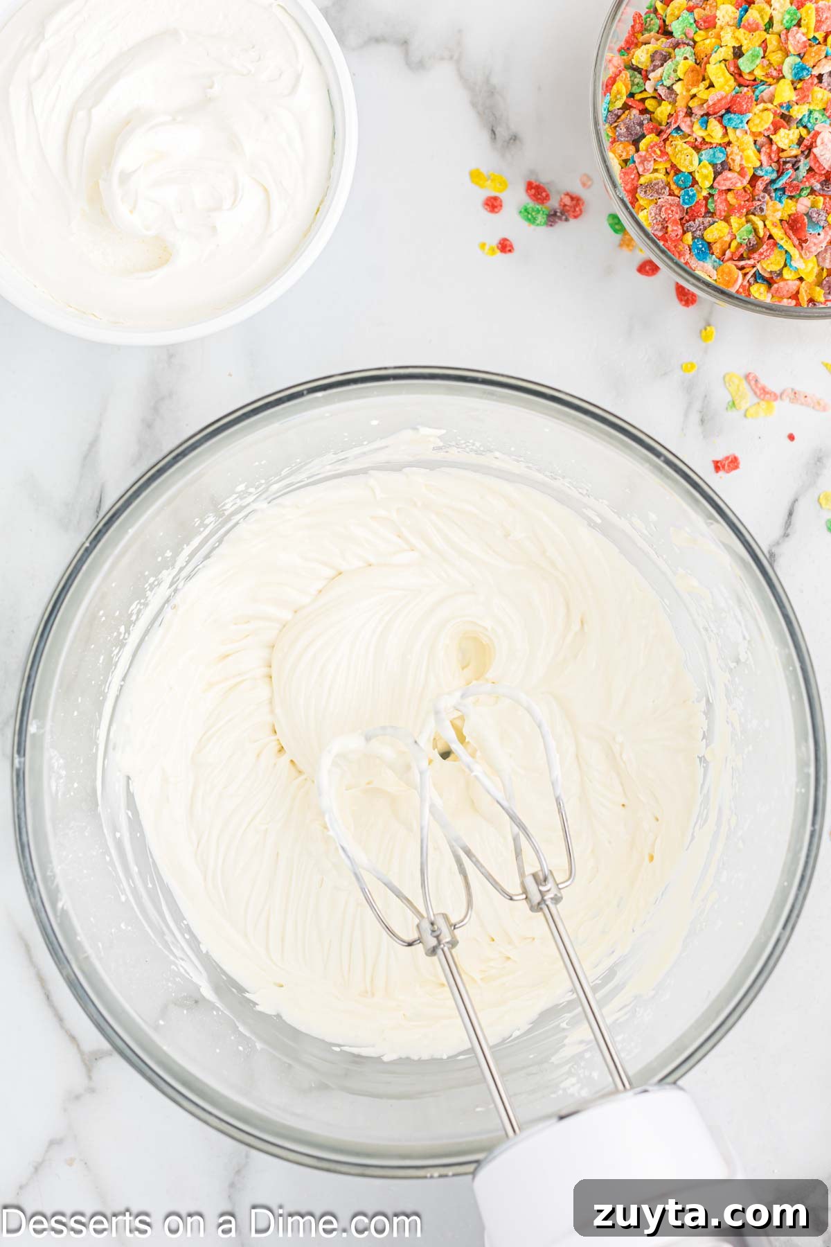 Fruity Pebbles Cheesecake Recipe with Rainbow Cereal Topping 6 Bowl of whipping cream.