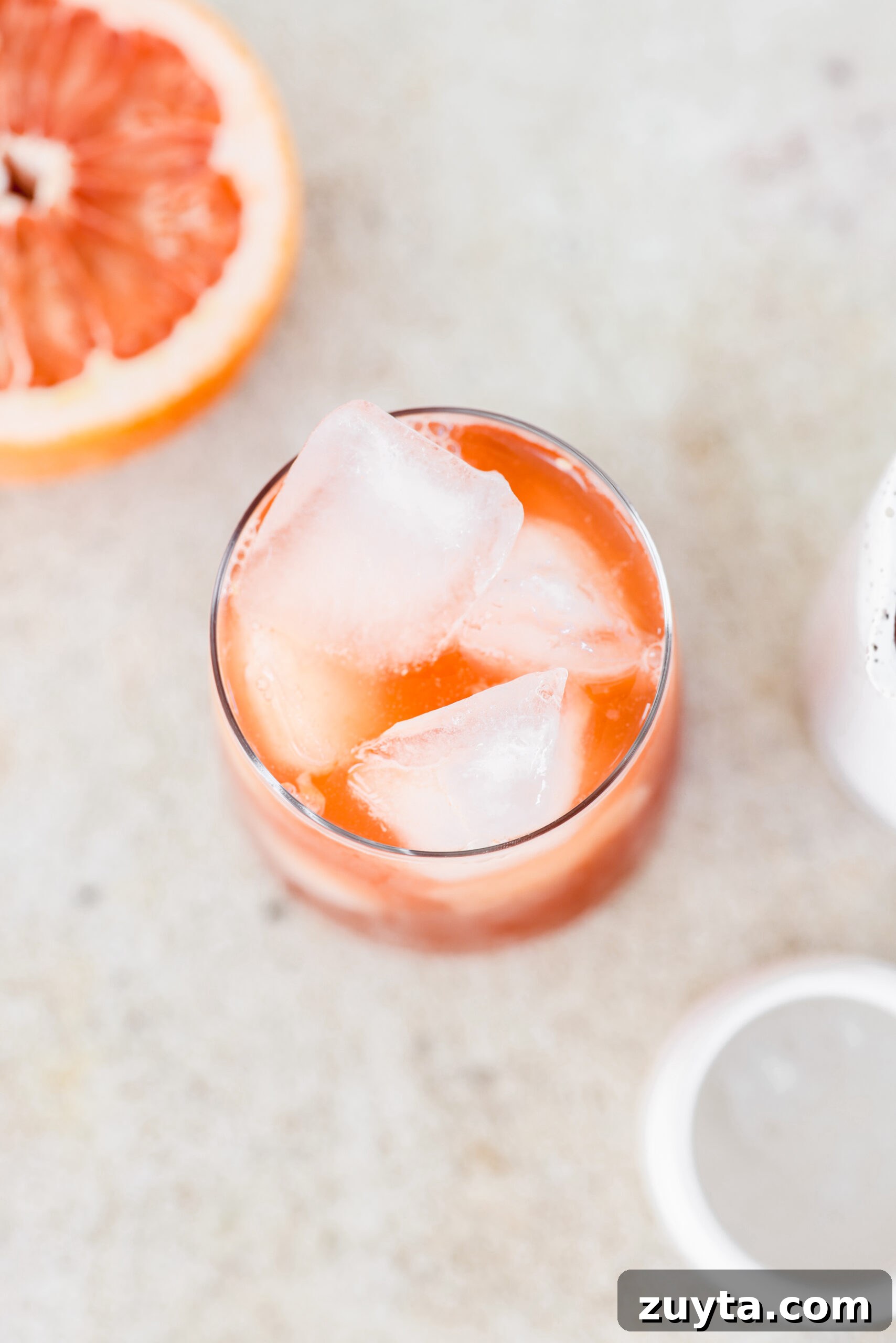 Hormone-Balancing Goji Grapefruit Tonic 2 overhead of gogi-grapefruit drink