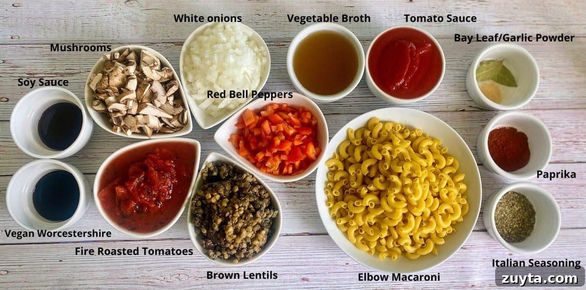 Hearty Vegan Goulash Recipe: Hungarian-Style Stew 3 Vegan Hungarian Goulash ingredients: elbow macaroni, brown cooked lentils, fire roasted tomatoes, vegan Worcestershire sauce, soy sauce, mushrooms, white onions, red bell peppers, vegetable broth, tomato sauce, bay leaves, garlic powder, paprika, and Italian seasoning.