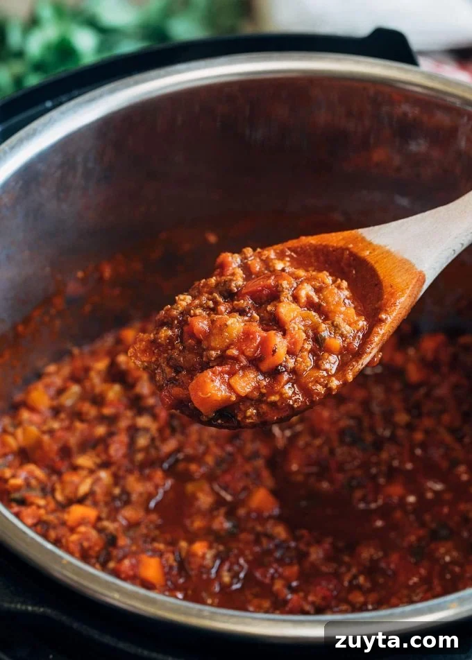 Instant Pot Bolognese Sauce Recipe 4 cooked instant pot bolognese on a spoon